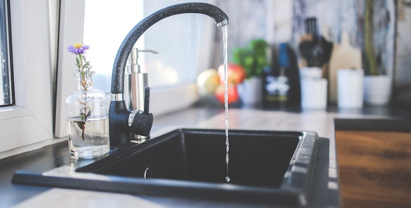 Kitchen sink with water