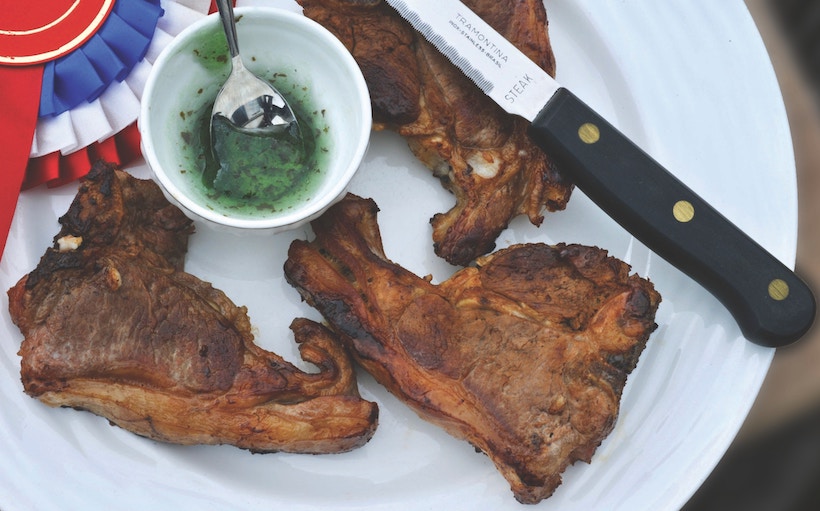 Micro-serrated steak knife next to meat