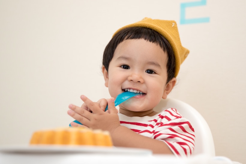 Toddler with a cake