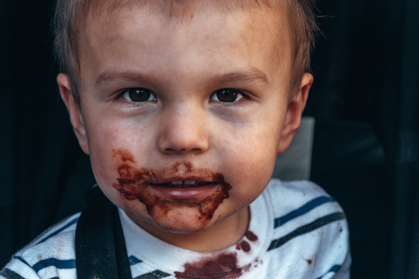 Toddler with chocolate on face