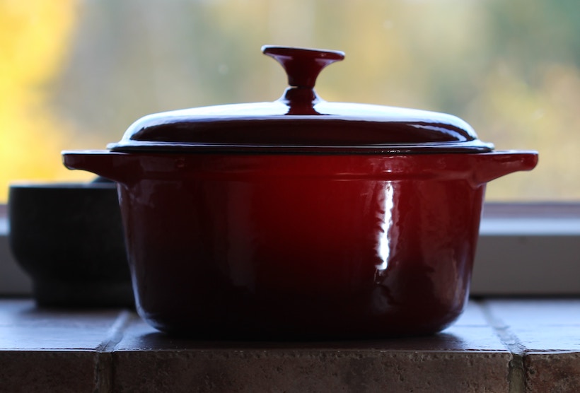 Dutch oven from the side on a stovetop