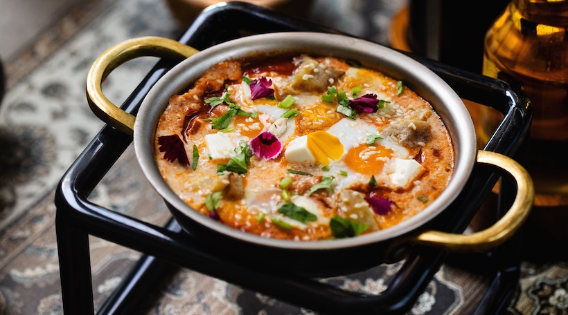 Omelet cooking on a stand