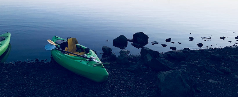 Kayak on a lake shore