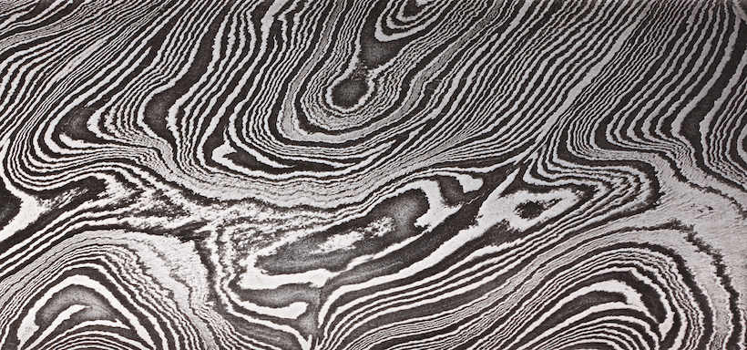 Background with pattern of Damask steel, close up