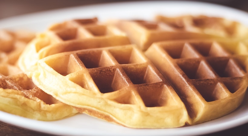 A closeup of golden brown waffles