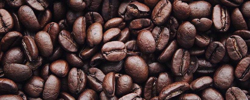 Brown coffee beans in a pile