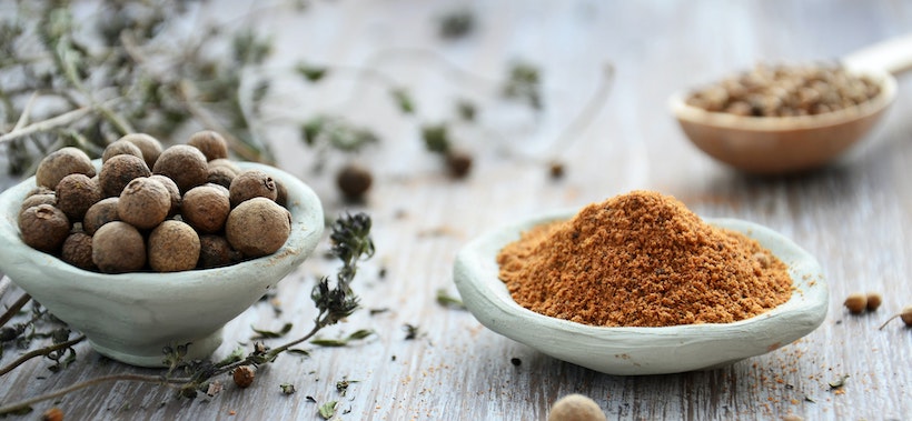 Nutmeg and other spices on a table