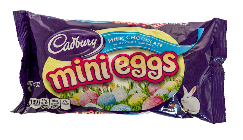 Bag of Cadbury mini eggs on an isolated background.